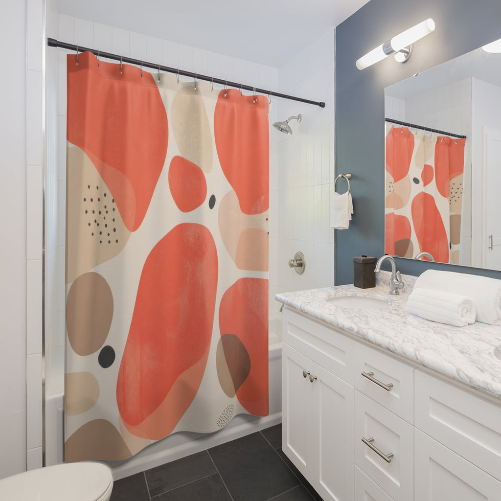 Coral organic pebbles with beige and charcoal accents shower curtain beside a white vanity