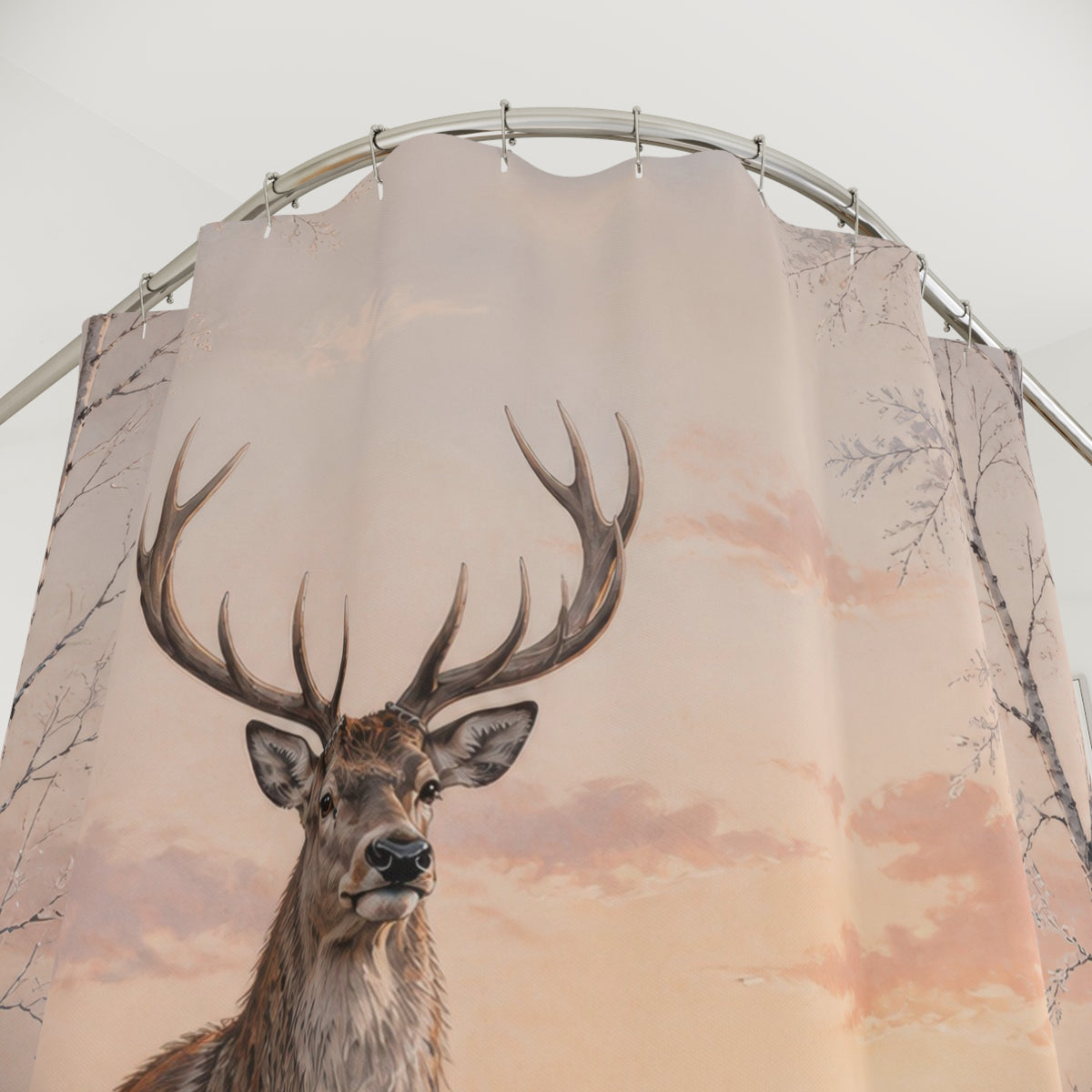 Stag on snowy birch ridge shower curtain with close-up print, hooks, and folds