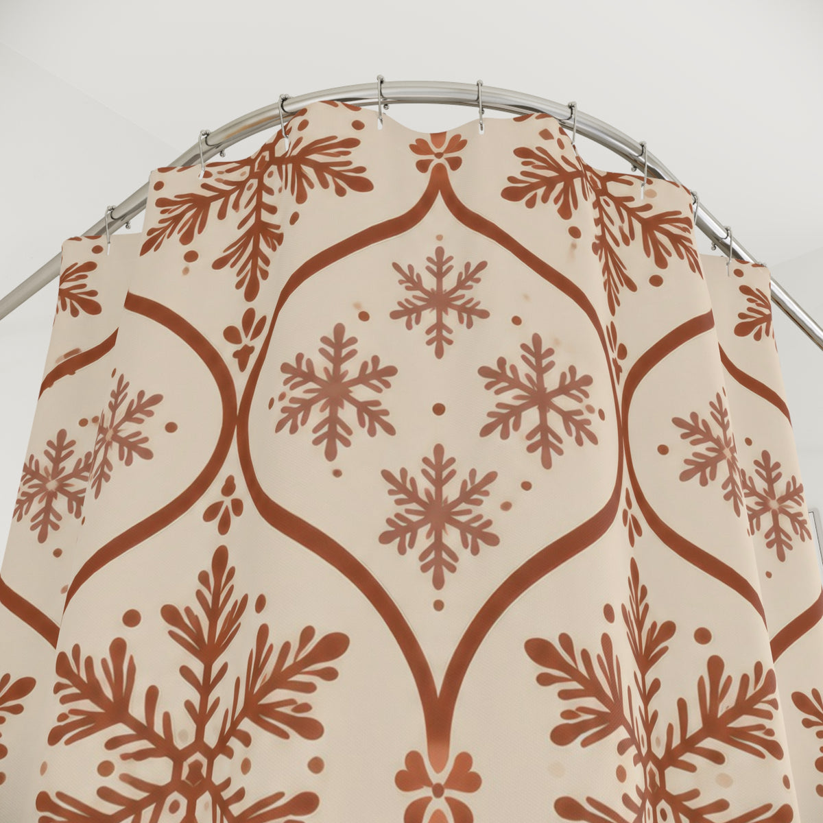 Cinnamon rust snowflakes in an ogee trellis on cream shower curtain with close-up print, hooks, and folds