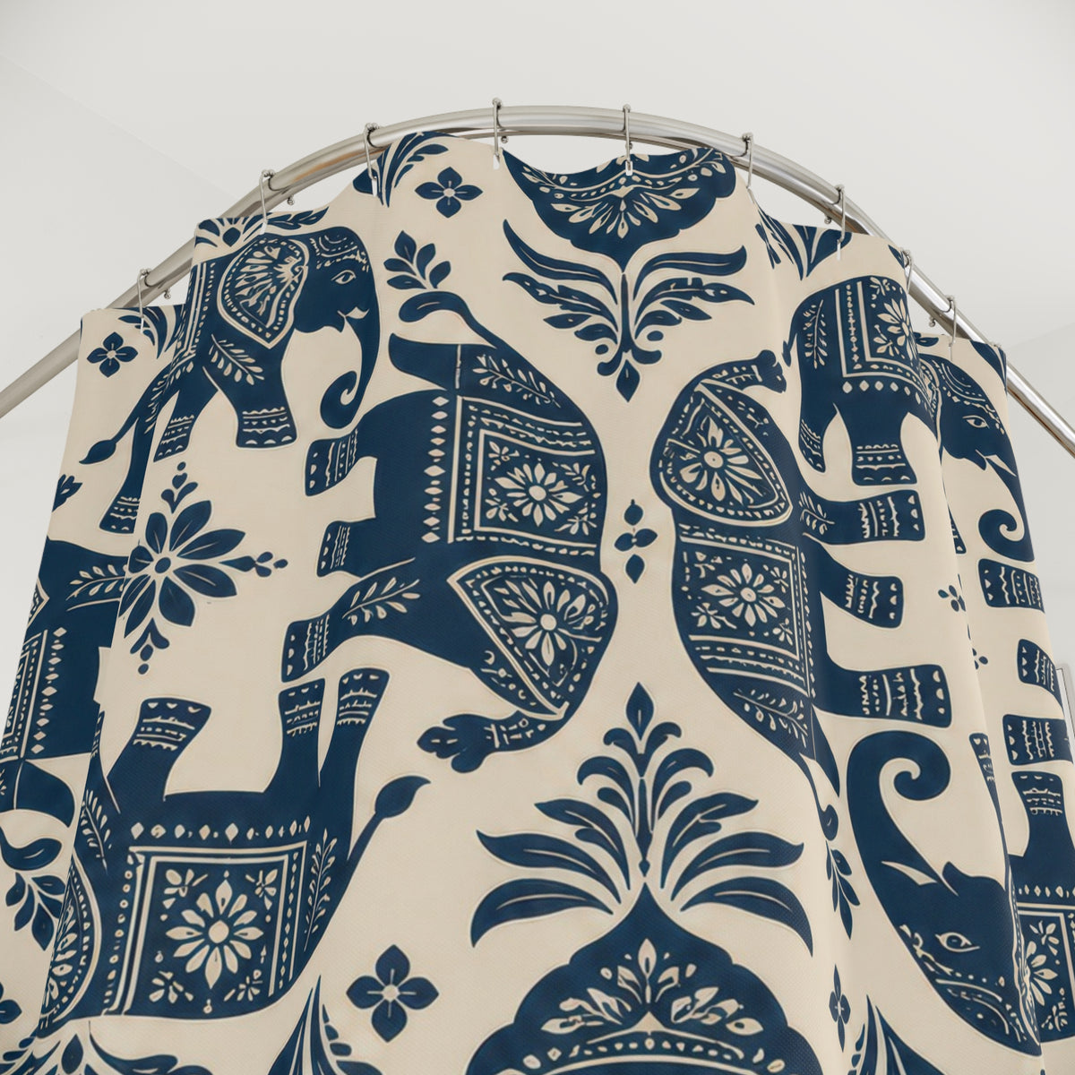 Indigo elephant folk pattern shower curtain with close-up print, hooks, and folds