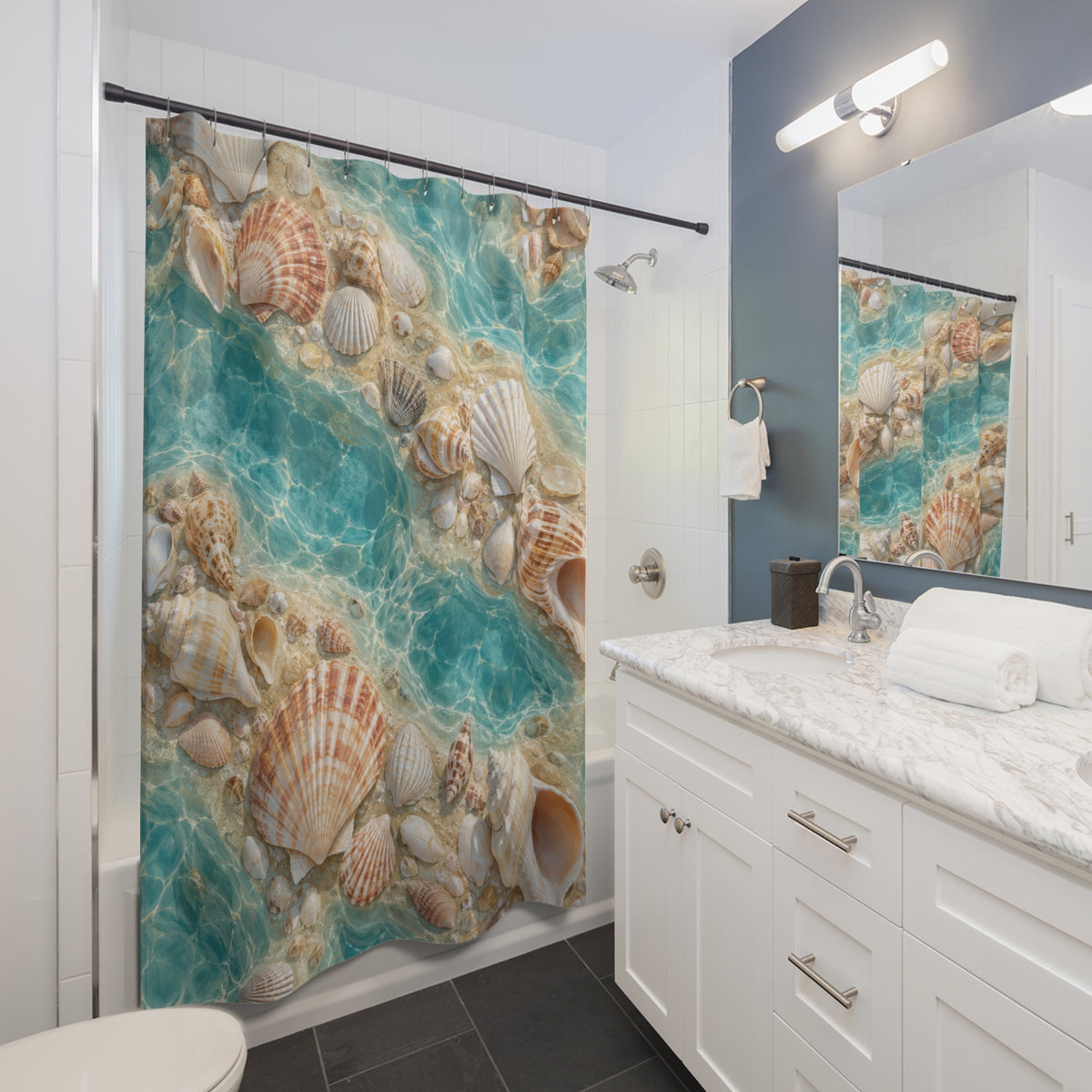 Ivory and apricot seashells around turquoise tide pools shower curtain beside a white vanity