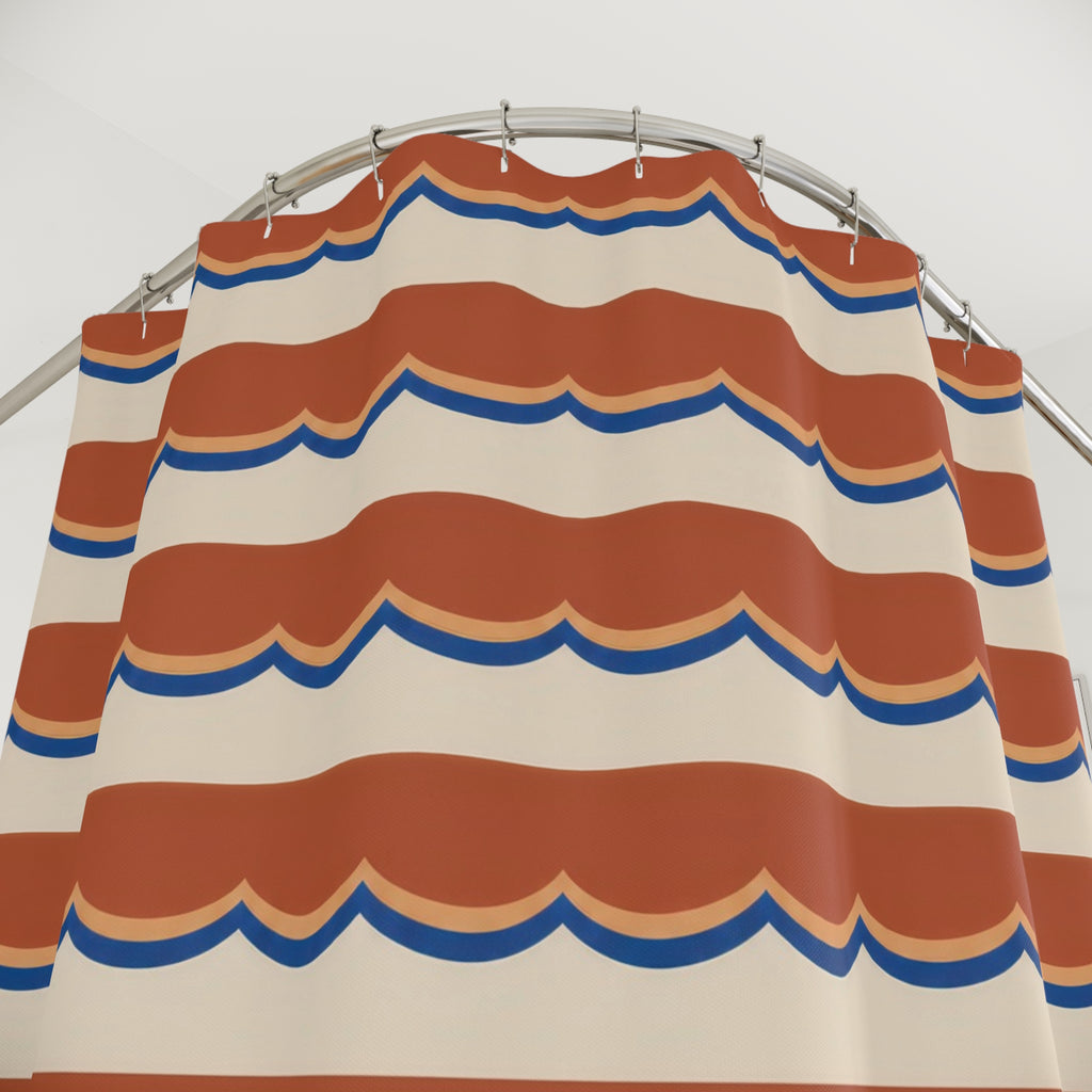 Terracotta scallop bands edged in apricot and blue on cream shower curtain with close-up print, hooks, and folds
