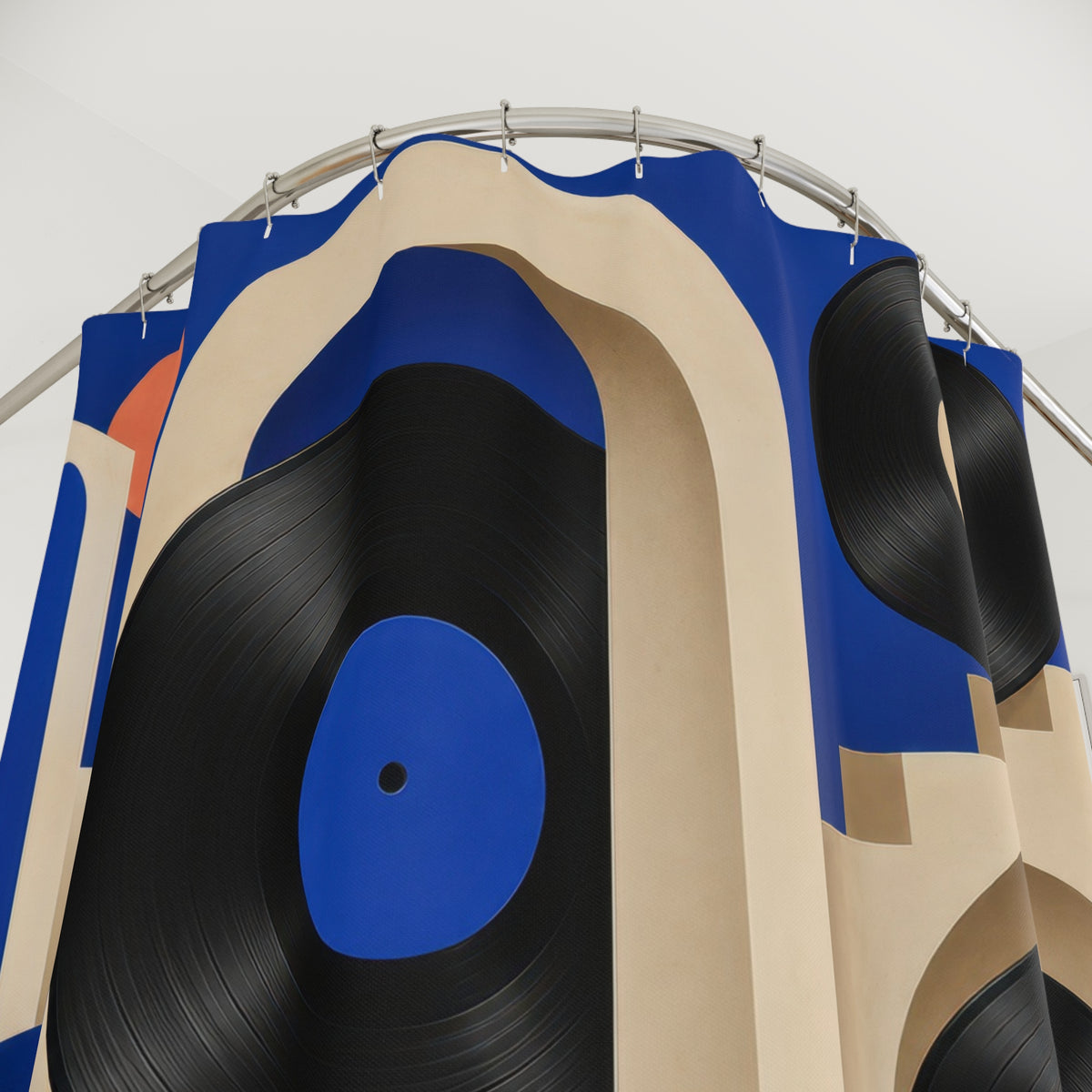 Vinyl records among cobalt and ivory arches shower curtain with close-up print, hooks, and folds