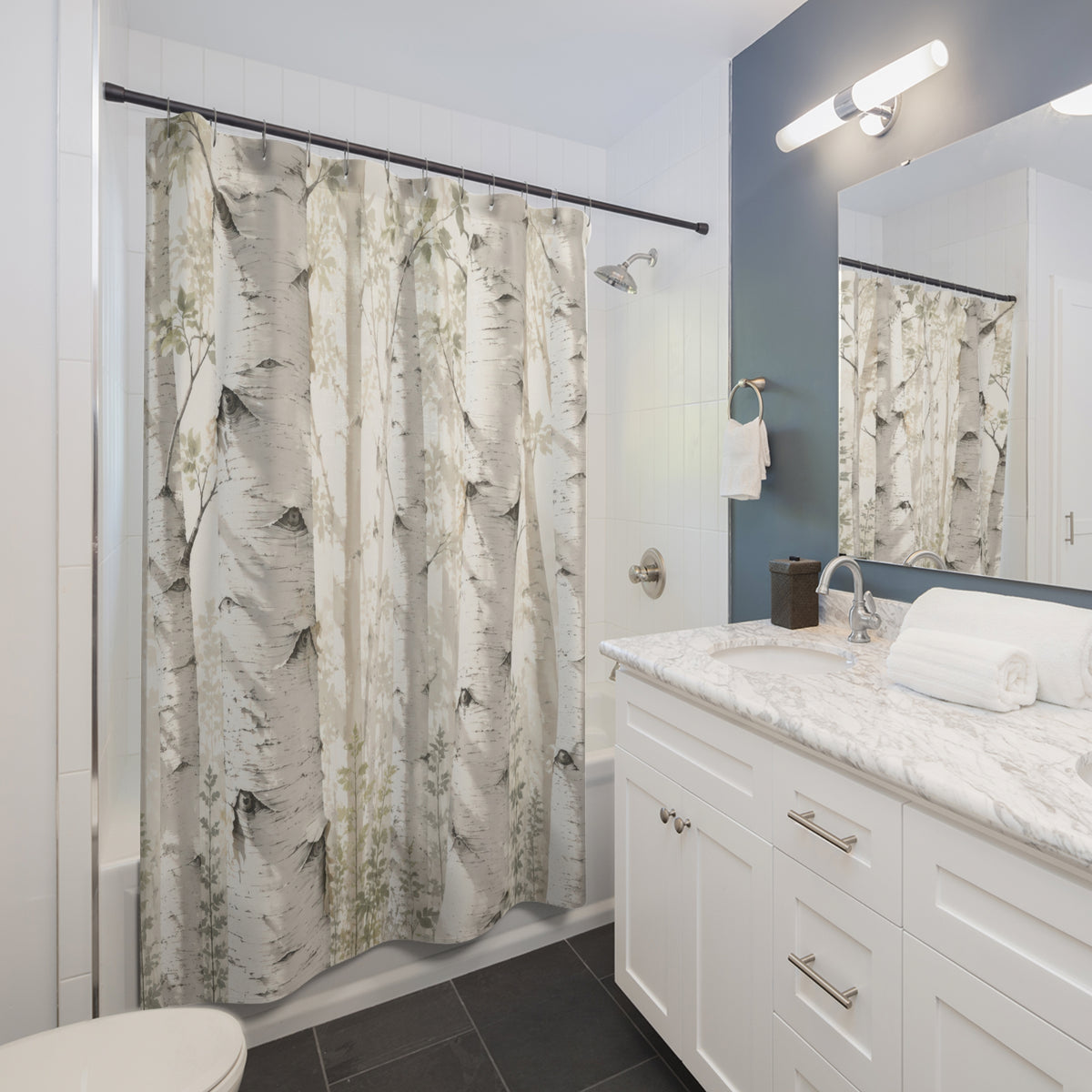 Ivory and sage white birch grove shower curtain beside a white vanity