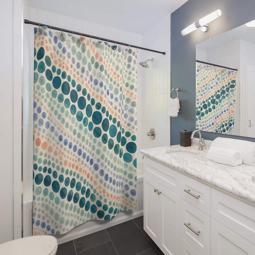 Teal watercolor polka dots in diagonal rows shower curtain beside a white vanity