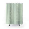 Paired olive and teal scalloped vertical lines on mint shower curtain with full front view