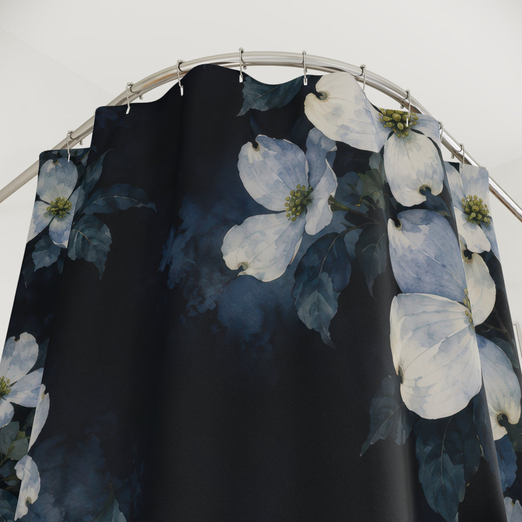 Pale blue and cream dogwood clusters on inky indigo shower curtain with close-up print, hooks, and folds