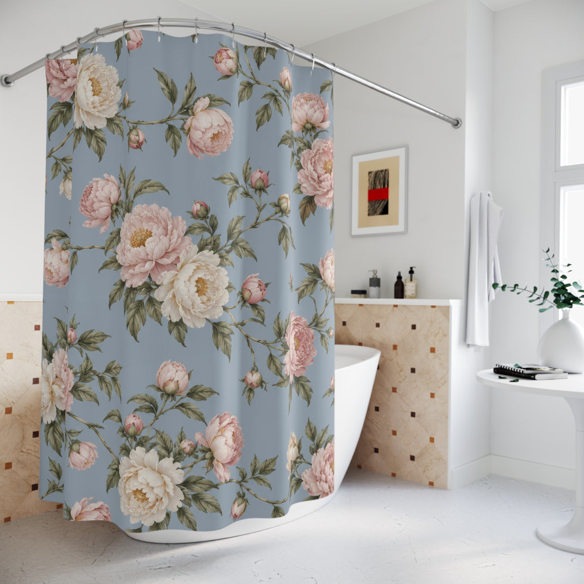Blush and ivory peonies on dusty blue shower curtain beside a freestanding tub