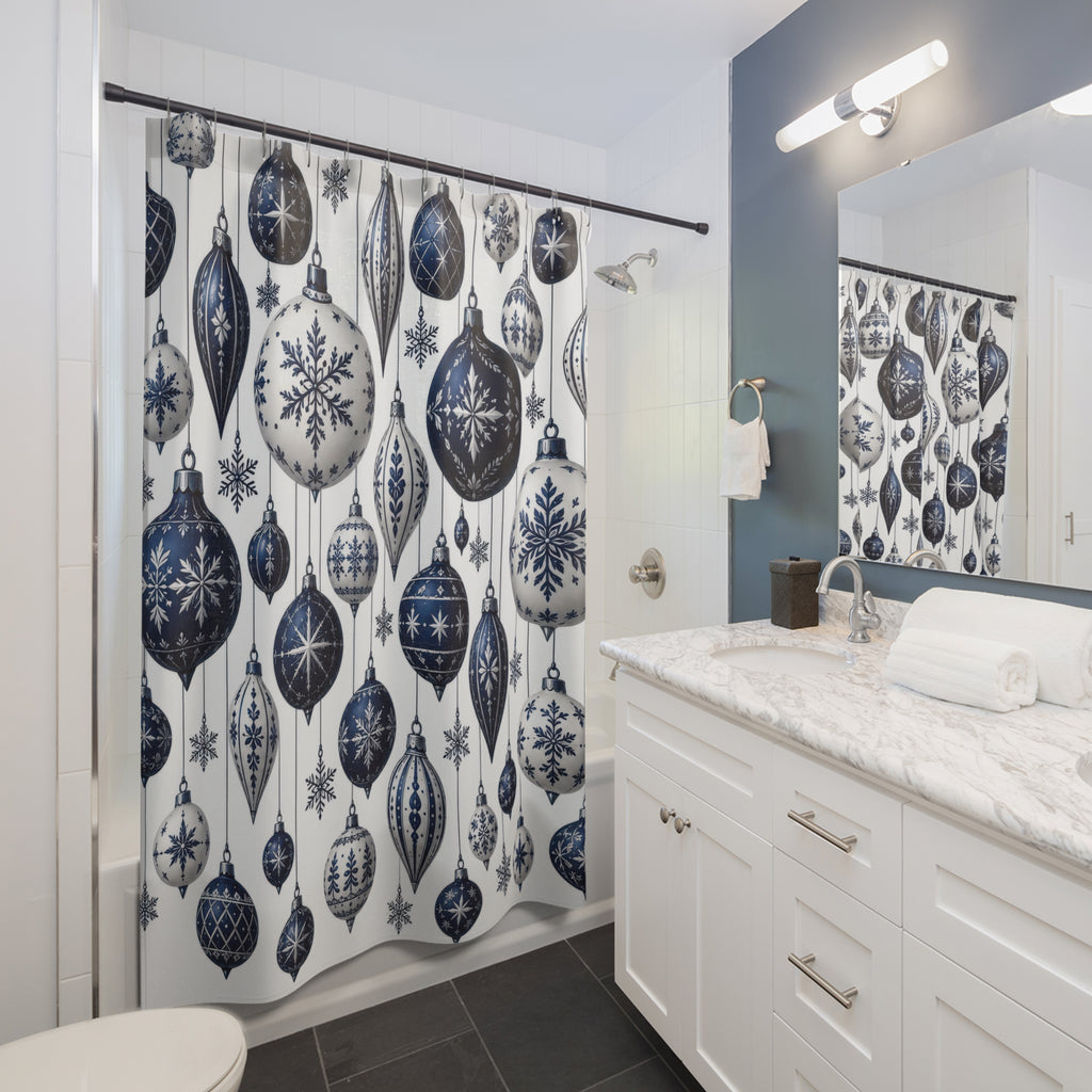 Navy and white hanging baubles with snowflakes and stars shower curtain beside a white vanity