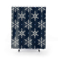 Ivory snowflakes and pale blue diamonds on navy shower curtain with full front view