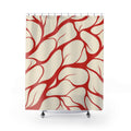 Red tapered branching lines across warm cream shower curtain with full front view