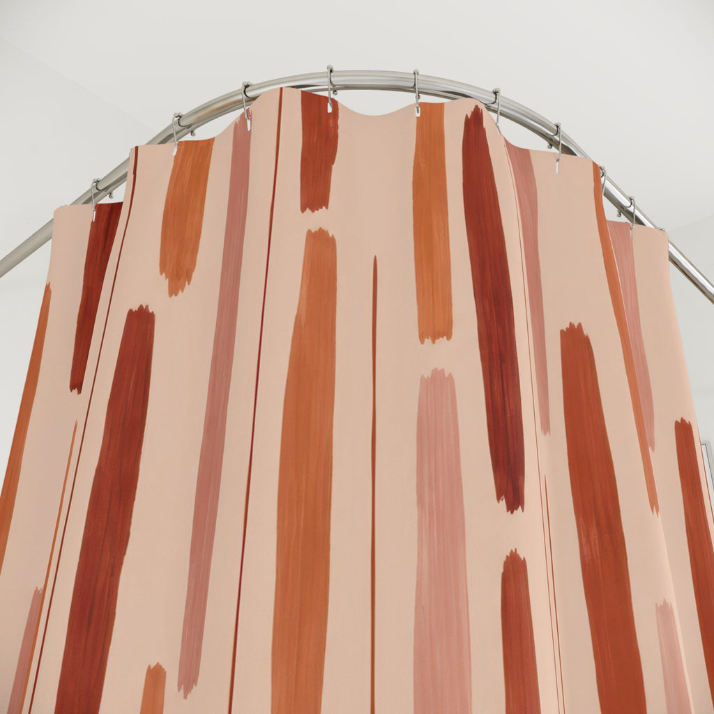 Terracotta rust and blush broken vertical strokes on peach shower curtain with close-up print, hooks, and folds
