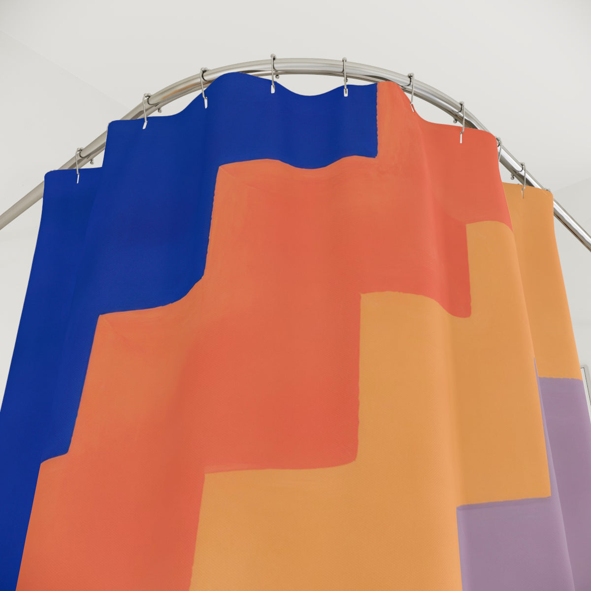 Cobalt coral and lilac stepped color bands shower curtain with close-up print, hooks, and folds