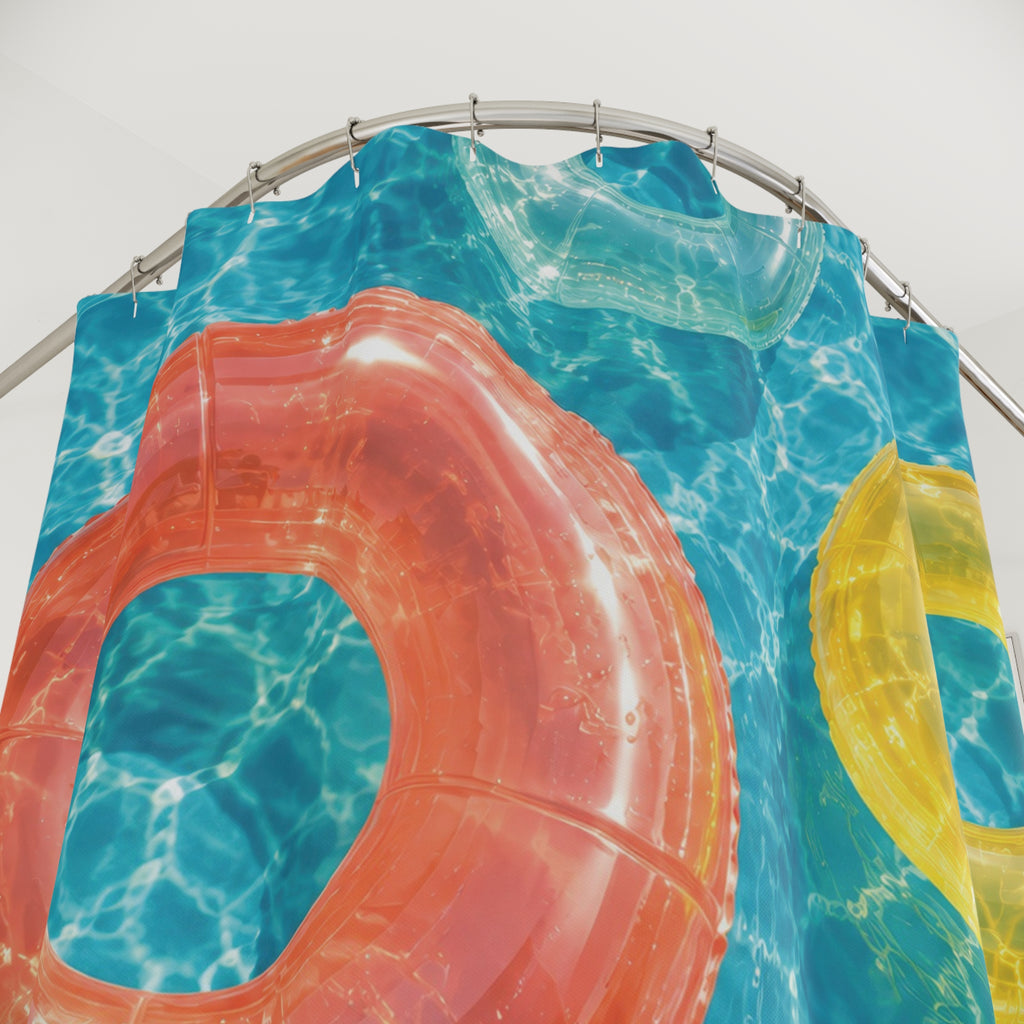 Coral, yellow and white pool floats on sunlit aqua water shower curtain with close-up print, hooks, and folds