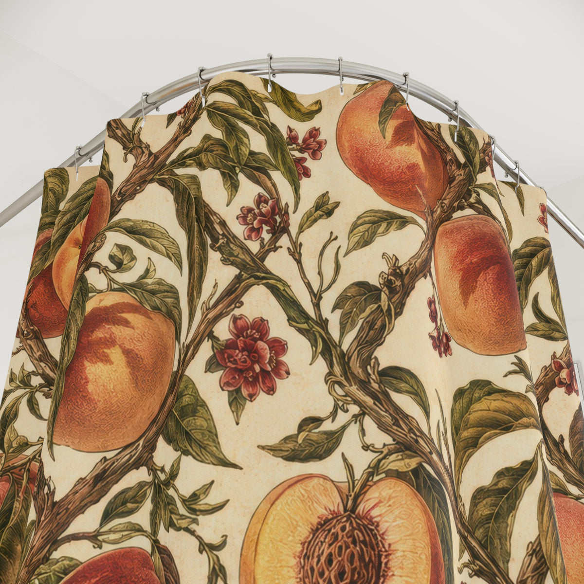 Peaches and olive leaves in a cream botanical trellis shower curtain with close-up print, hooks, and folds