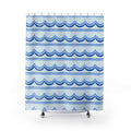 Cornflower and cobalt scallop bands on pale blue shower curtain with full front view