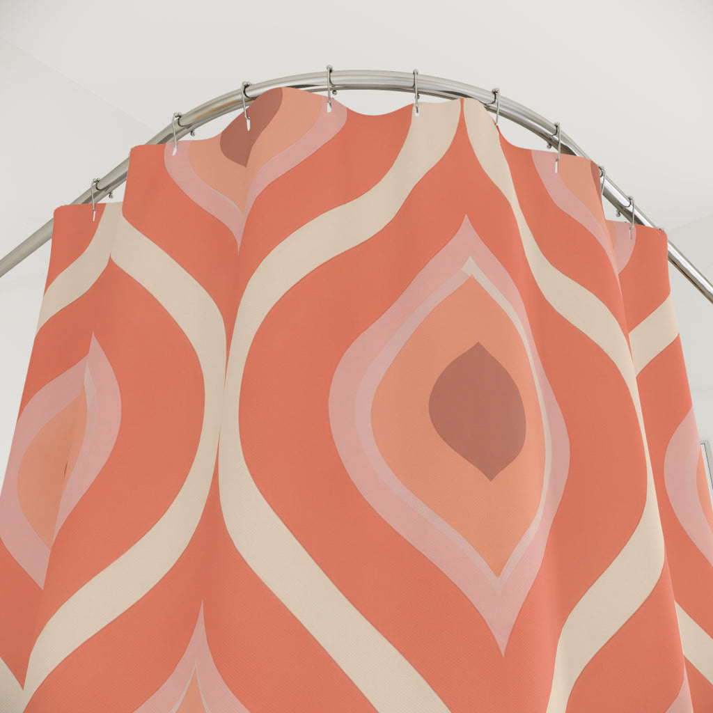 Nested coral and cream lozenges in a retro repeat shower curtain with close-up print, hooks, and folds