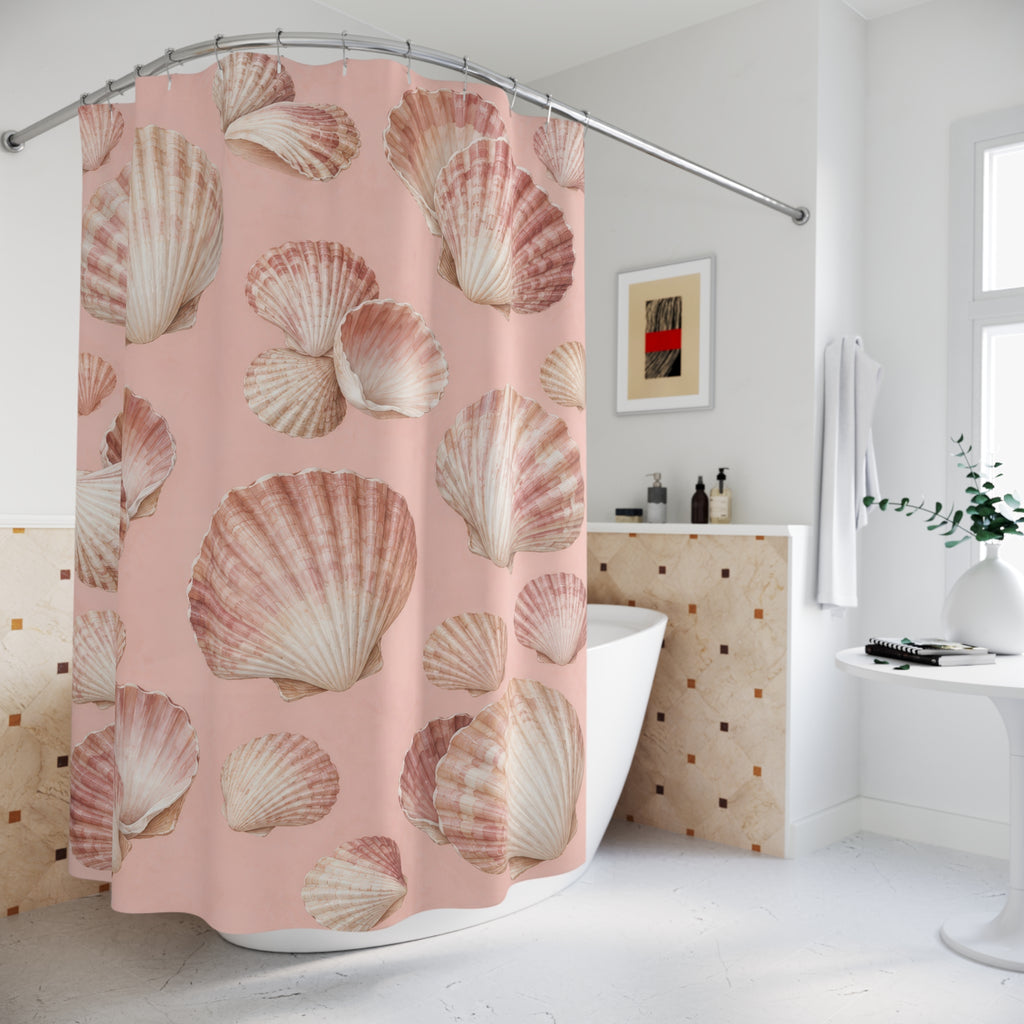 Ivory and rose seashells on blush pink shower curtain beside a freestanding tub