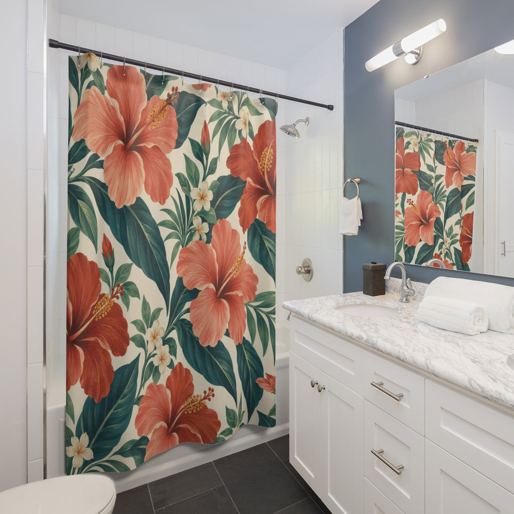 Coral hibiscus with teal leaves on ivory shower curtain beside a white vanity