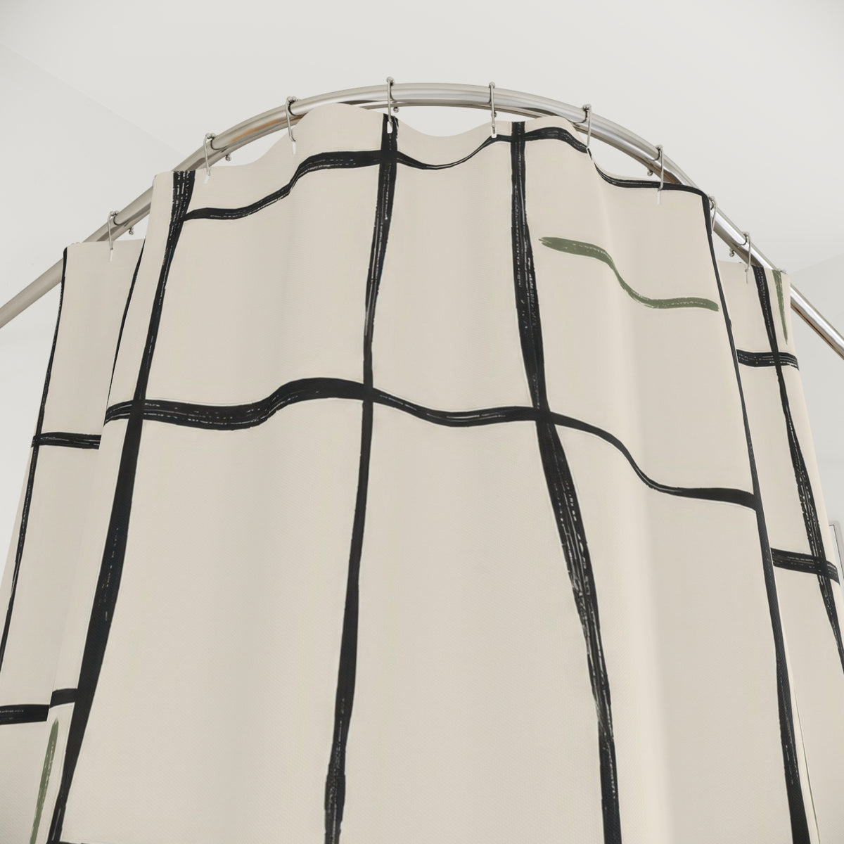 Charcoal irregular grid with sage strokes on ivory shower curtain with close-up print, hooks, and folds