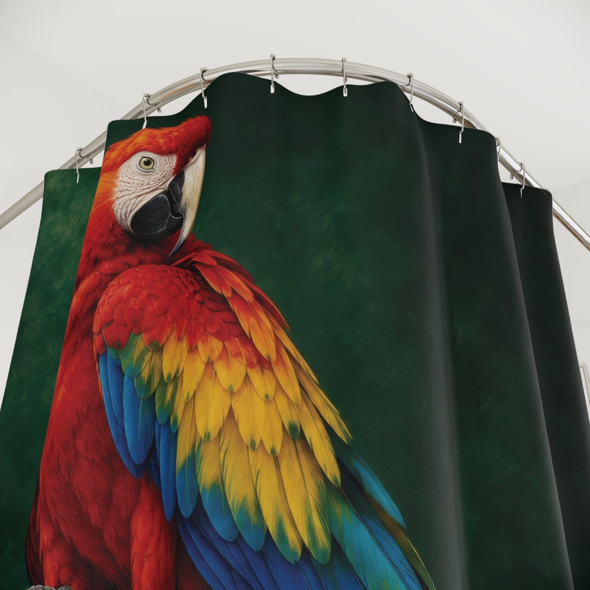 Scarlet macaw with blue and yellow feathers on dark green shower curtain with close-up print, hooks, and folds