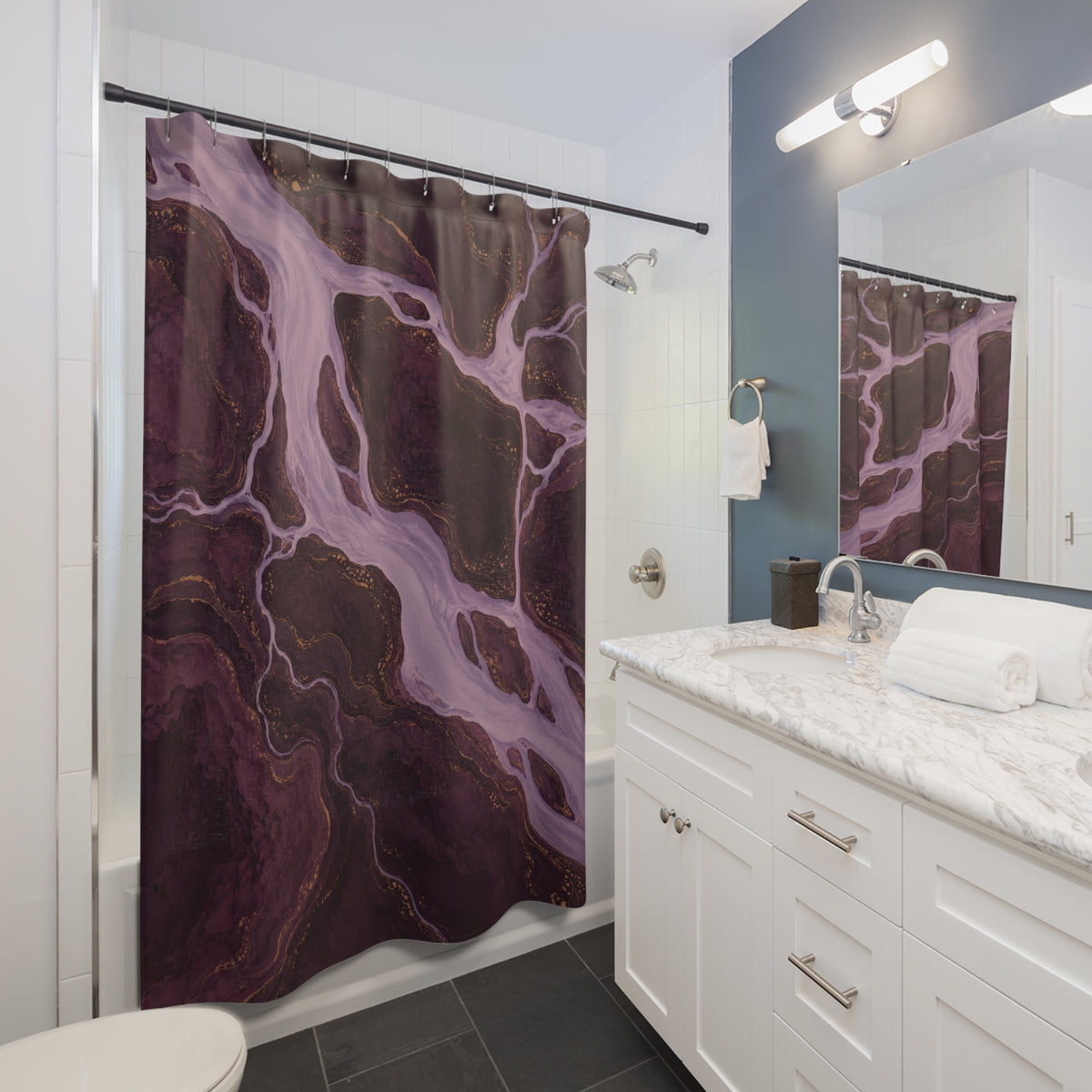 Lavender rivers around plum islands with ochre contours shower curtain beside a white vanity
