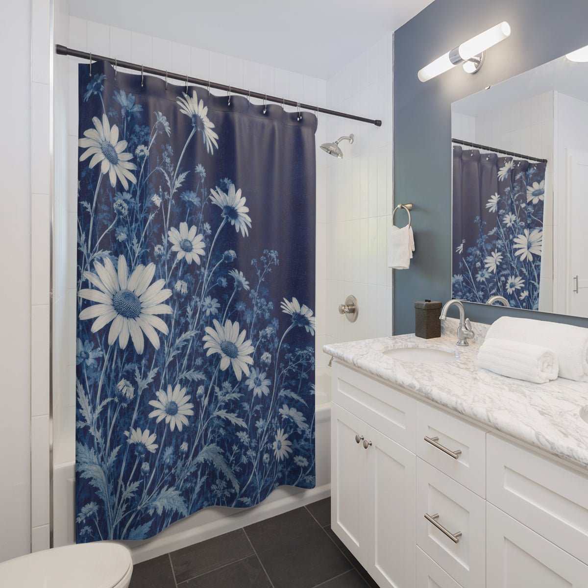Indigo and ivory daisy meadow shower curtain beside a white vanity