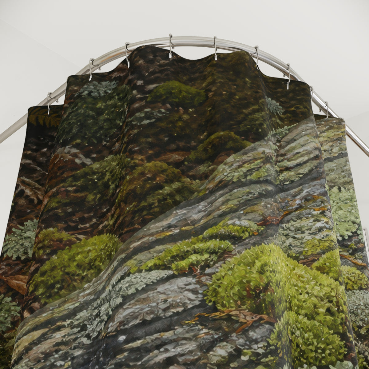 Moss and branching lichen growing across forest stone shower curtain with close-up print, hooks, and folds