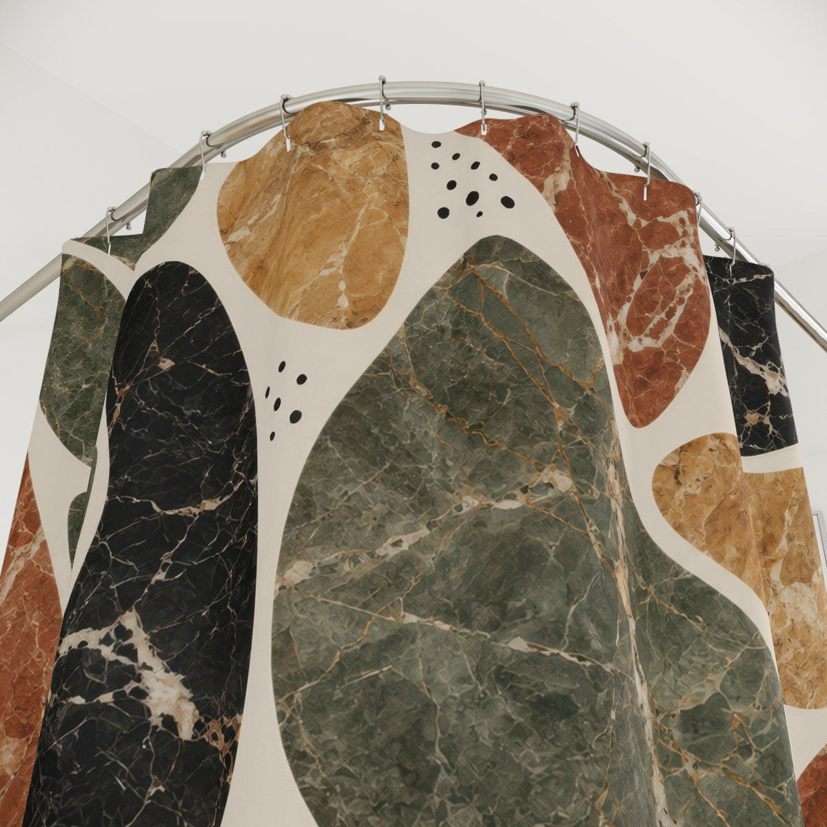 Sage, terracotta, ochre and black marble shapes on cream shower curtain with close-up print, hooks, and folds