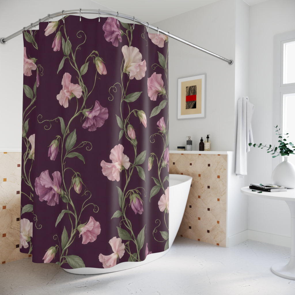 Pink sweet pea vines on plum with sage leaves shower curtain beside a freestanding tub