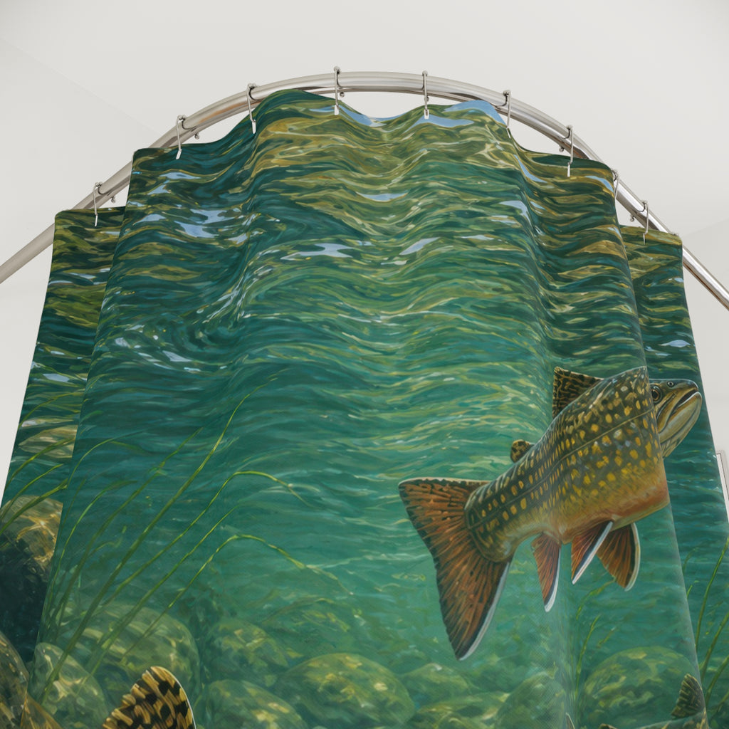 Speckled brook trout swimming above river stones in teal water shower curtain with close-up print, hooks, and folds