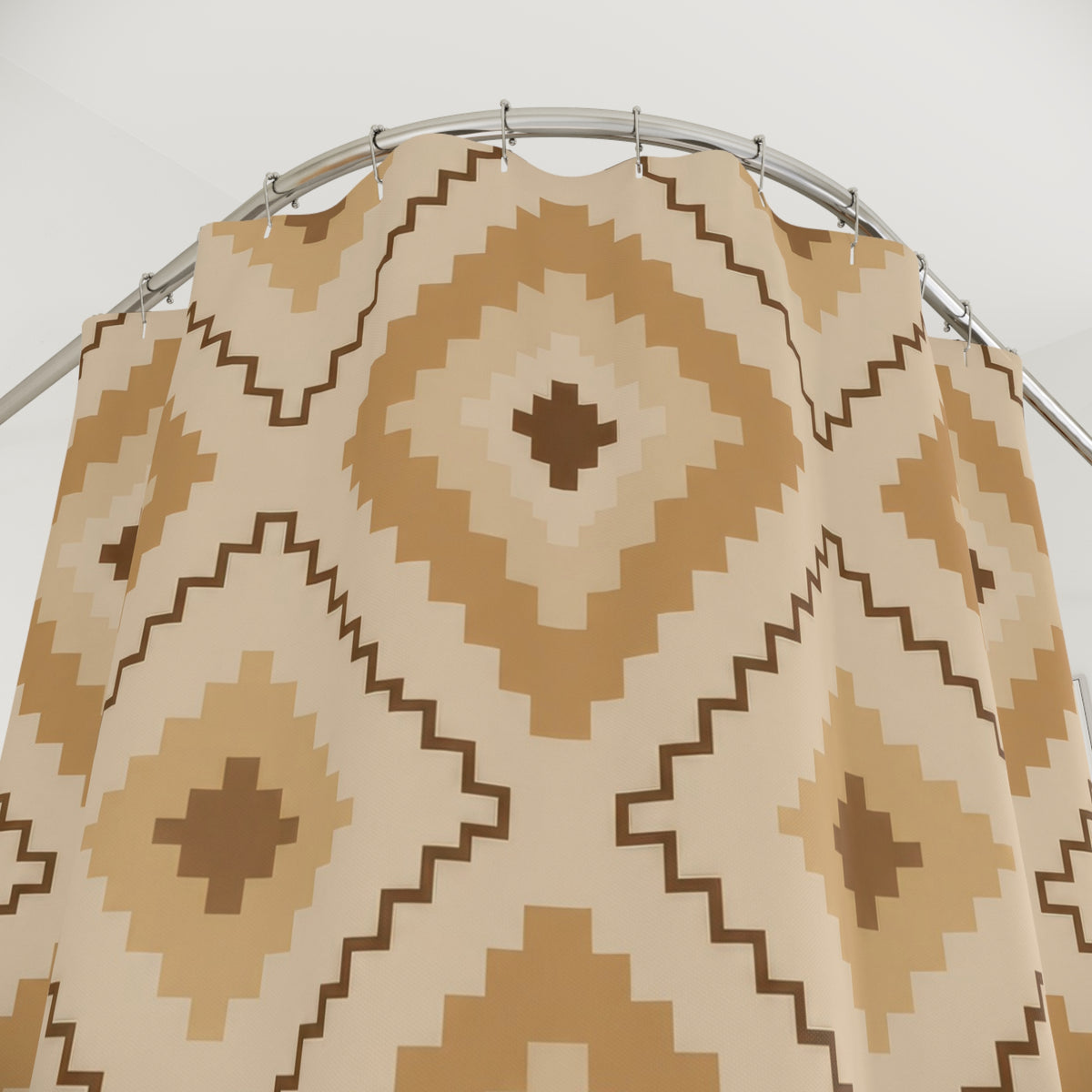 Nested tan and camel stepped diamond geometric pattern shower curtain with close-up print, hooks, and folds
