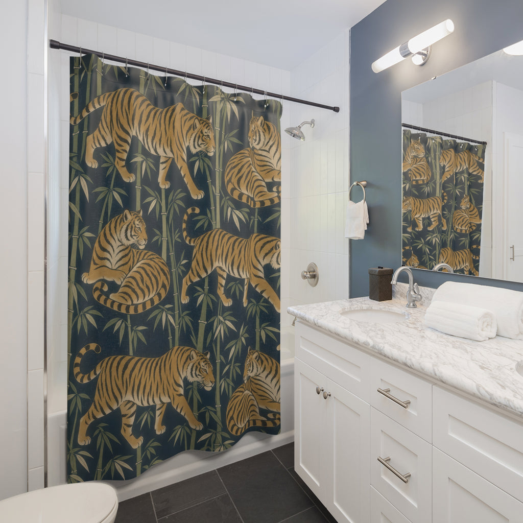 Ochre tiger and olive bamboo pattern on indigo shower curtain beside a white vanity
