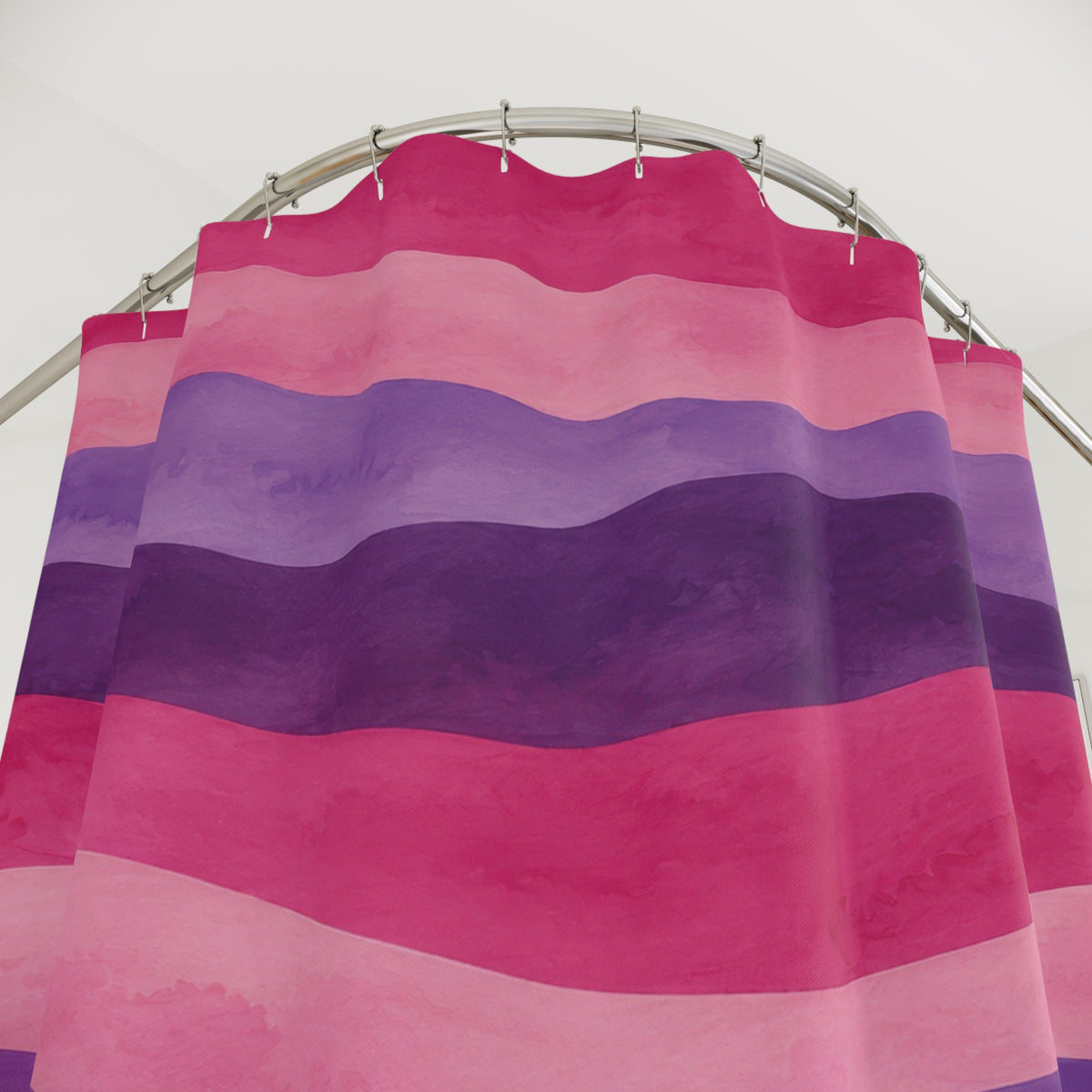 Wavy watercolor stripes in pink, lavender and plum shower curtain with close-up print, hooks, and folds