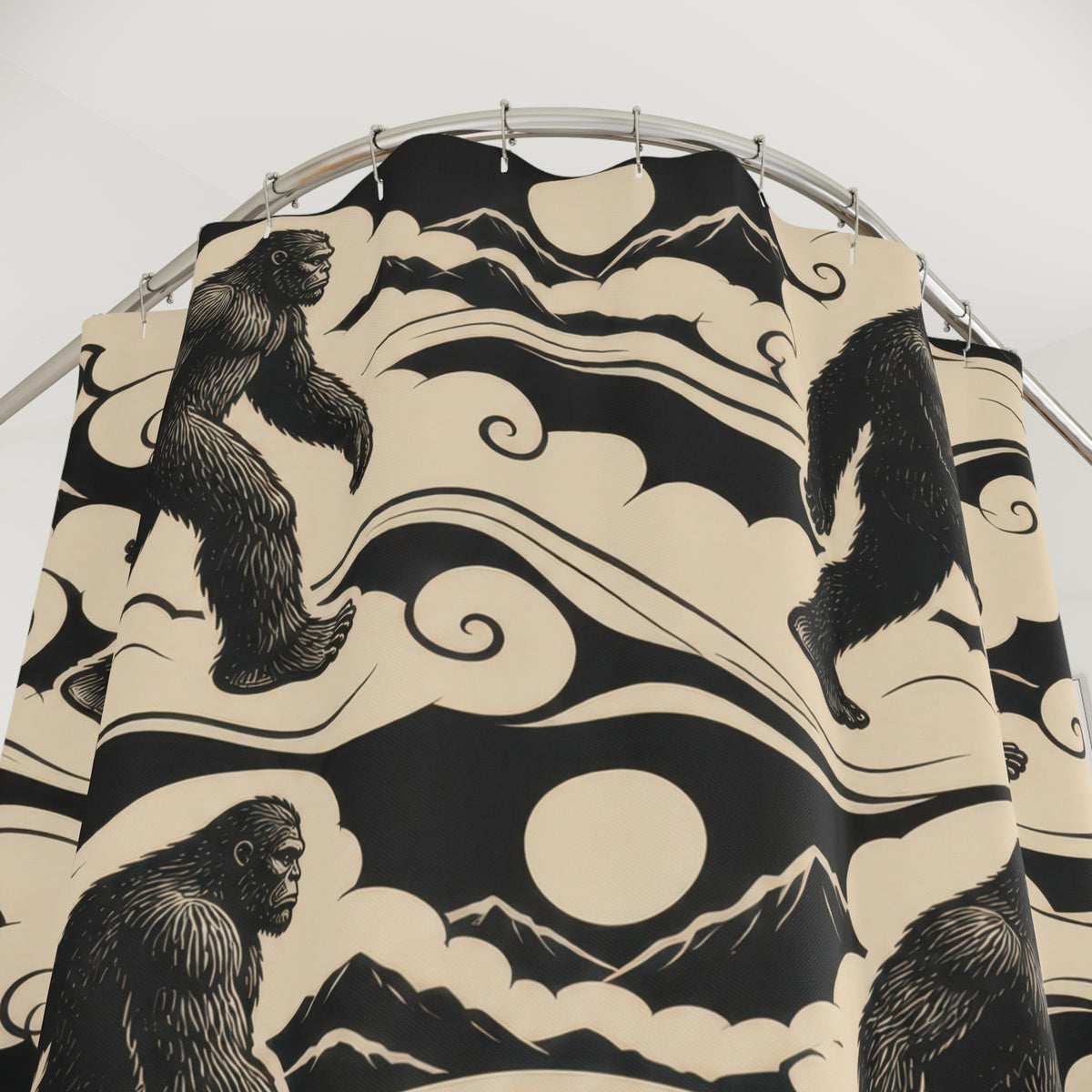Black Bigfoot figures in cream cloud bands with mountains shower curtain with close-up print, hooks, and folds