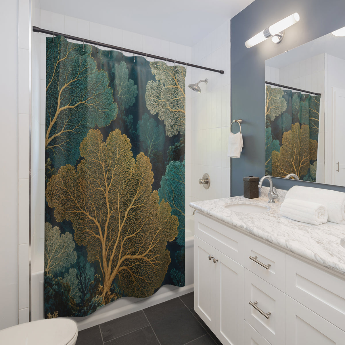Gold, cream and turquoise sea fan coral in a deep teal reef shower curtain beside a white vanity