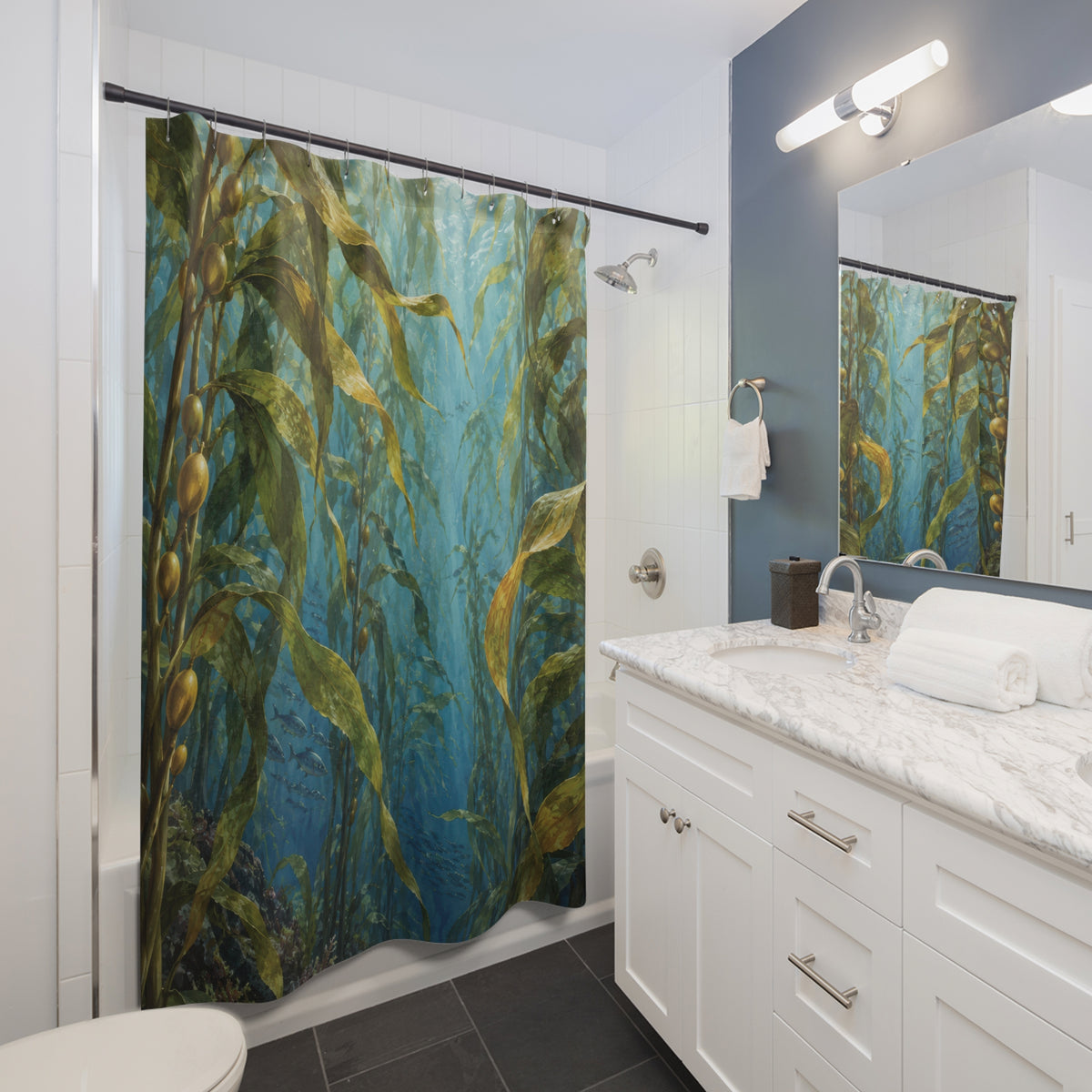 Olive green kelp and small silver-blue fish in sunlit blue water shower curtain beside a white vanity