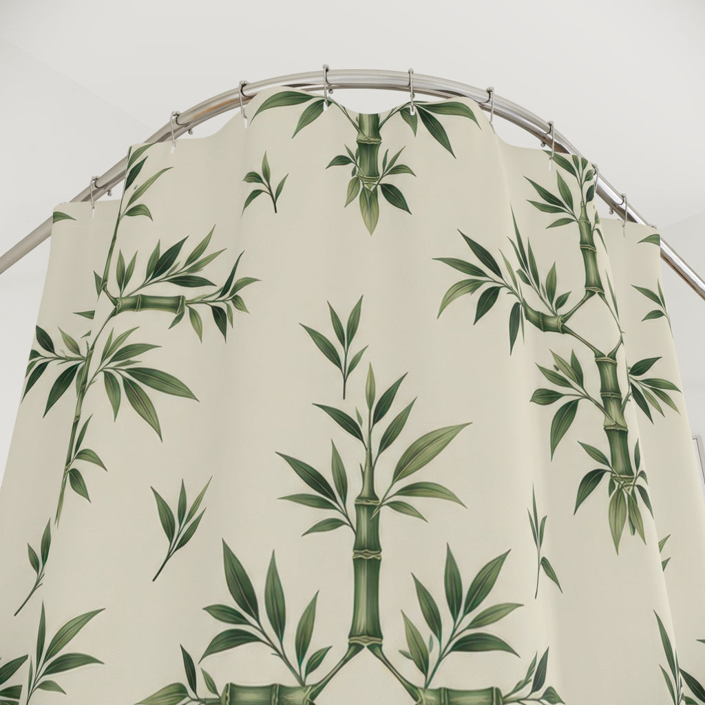 Sage bamboo ornaments and leaf sprigs on cream shower curtain with close-up print, hooks, and folds