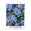Blue hydrangea clusters among broad green leaves shower curtain with full front view