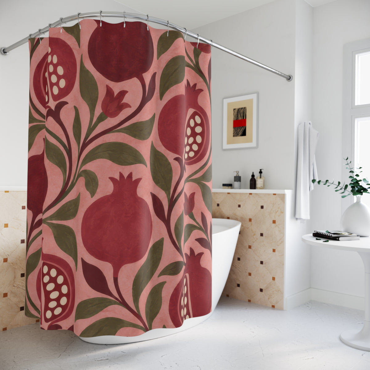 Pink and burgundy pomegranates with olive leaves on rose shower curtain beside a freestanding tub