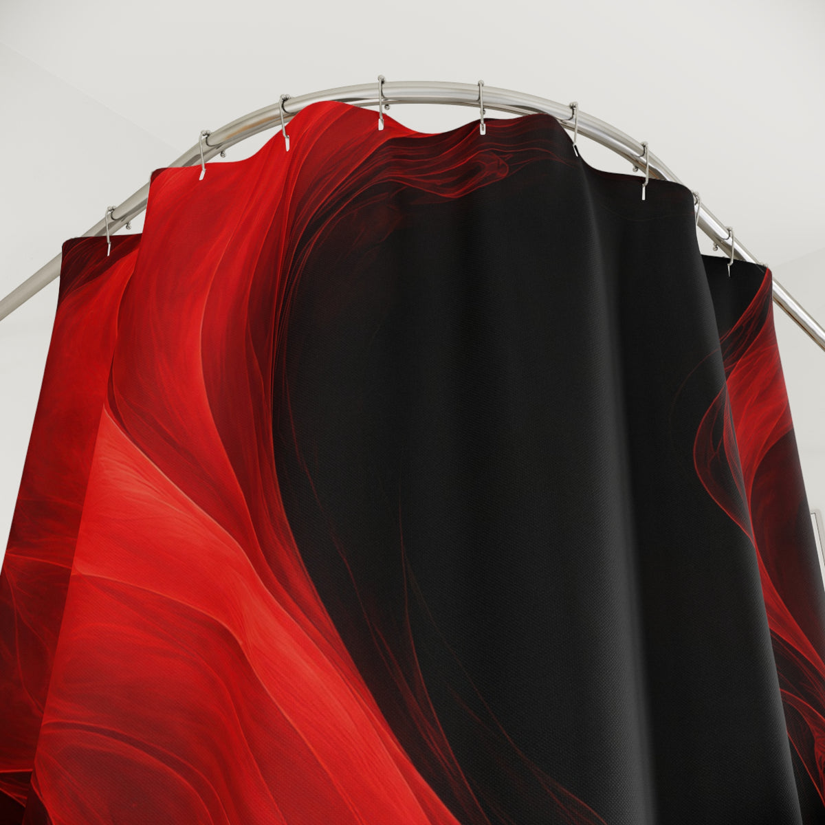 Flowing scarlet currents curling around black pools shower curtain with close-up print, hooks, and folds