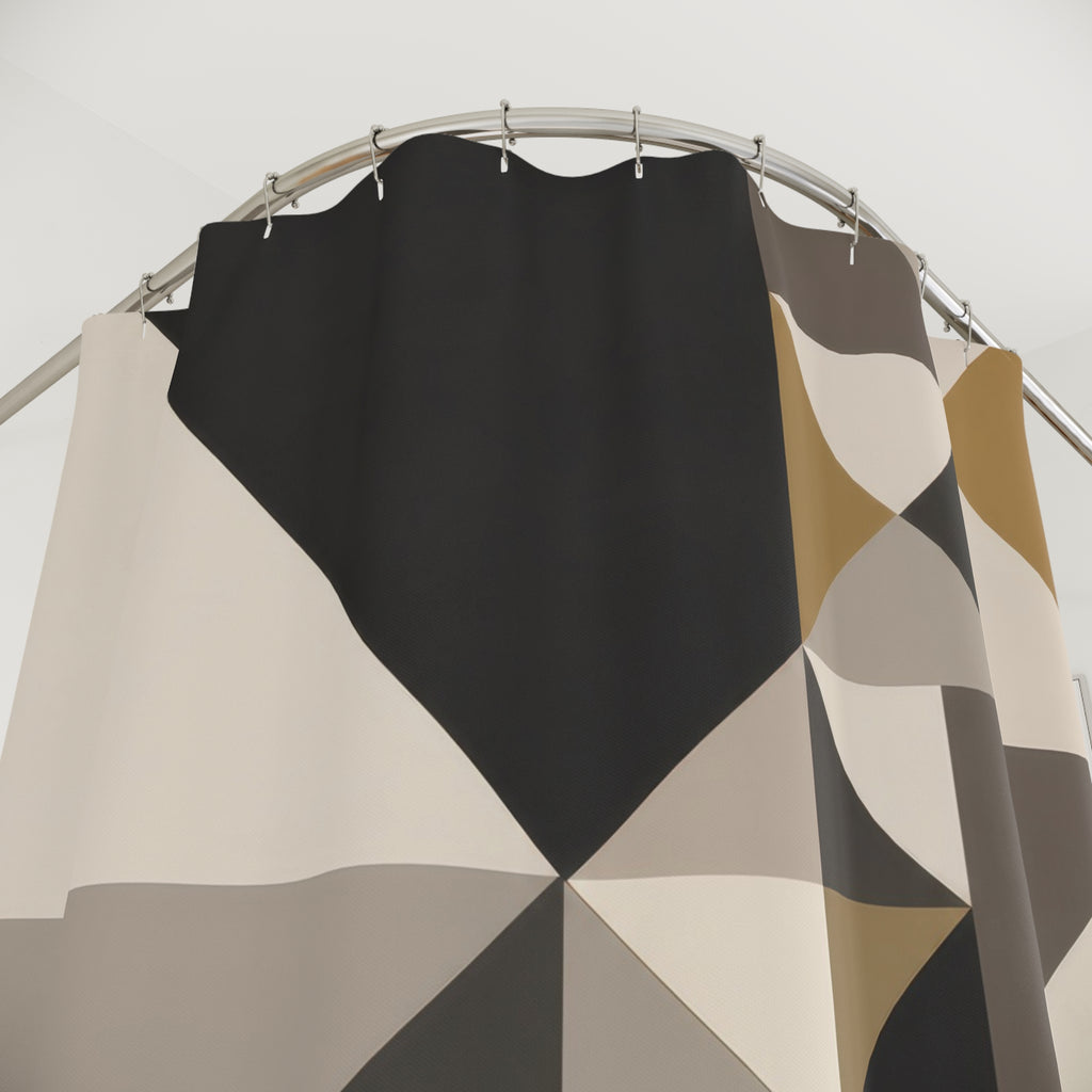 Geometric triangles in charcoal, ivory, taupe and ochre shower curtain with close-up print, hooks, and folds