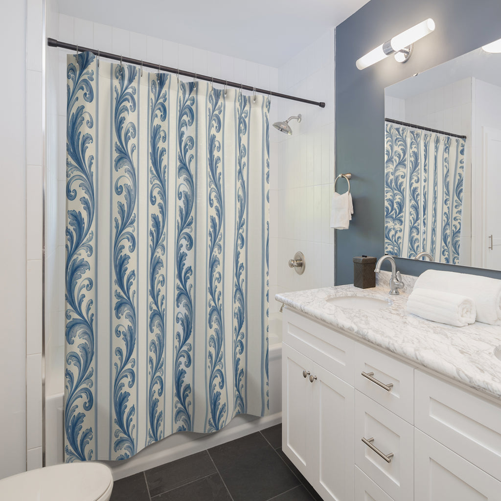 French-blue acanthus leaf stripes on warm ivory shower curtain beside a white vanity