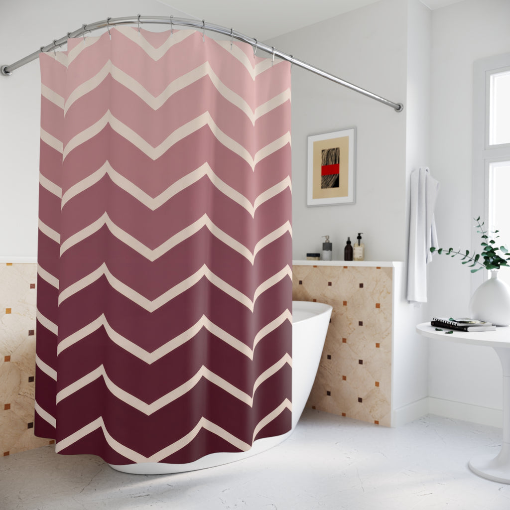 Blush to burgundy ombre chevrons with cream lines shower curtain beside a freestanding tub