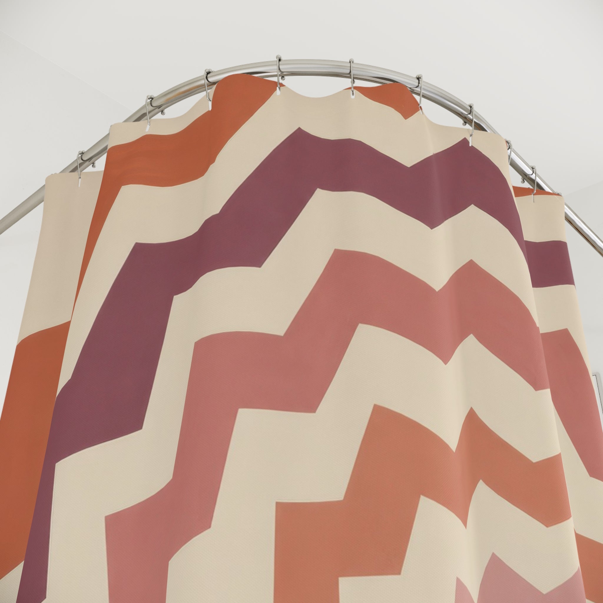 Terracotta and plum nested zigzag diamond ripples shower curtain with close-up print, hooks, and folds