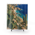 Green coastal cactus above a turquoise cove and peach cliffs shower curtain with full front view