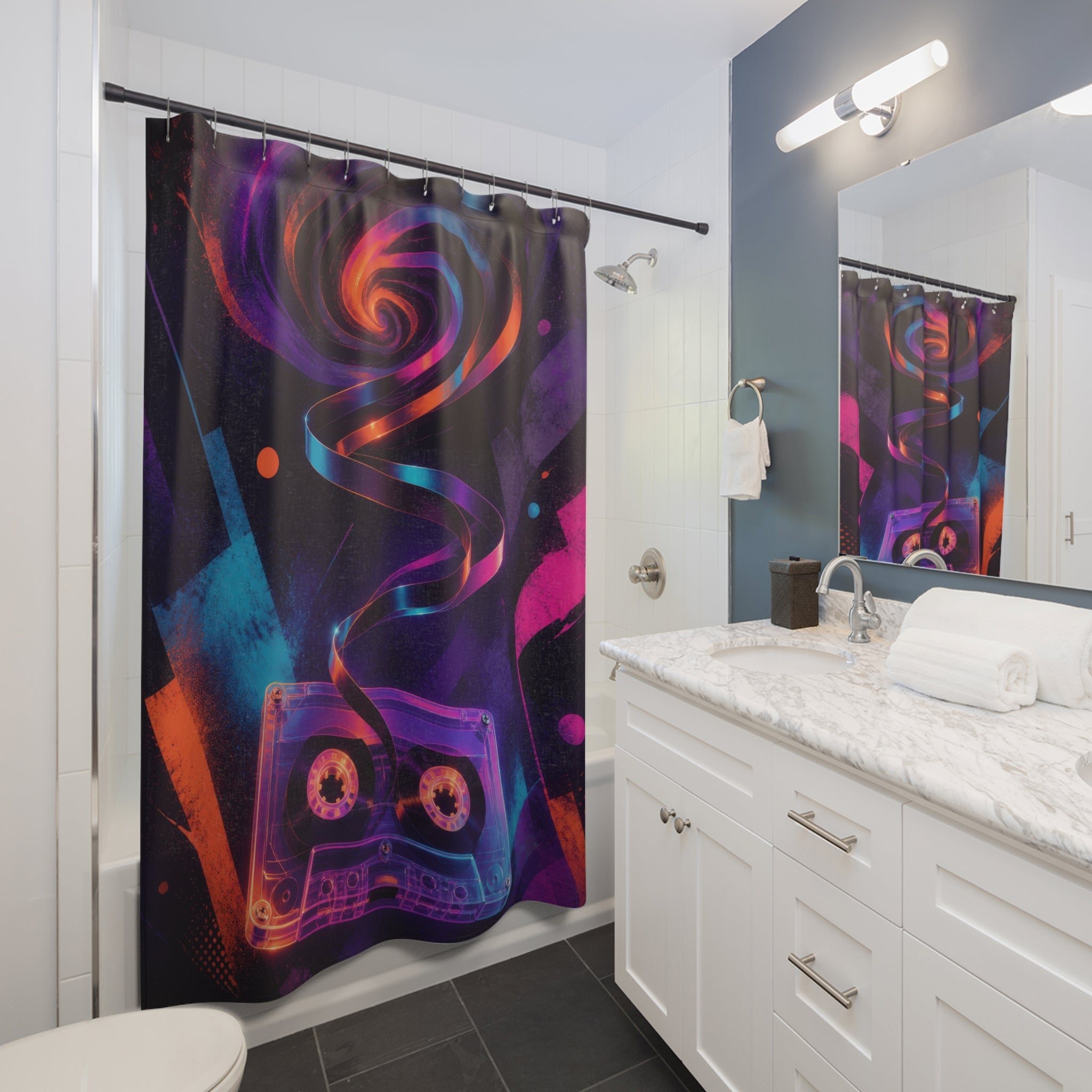 Translucent cassette with spiraling tape and neon spray shapes shower curtain beside a white vanity