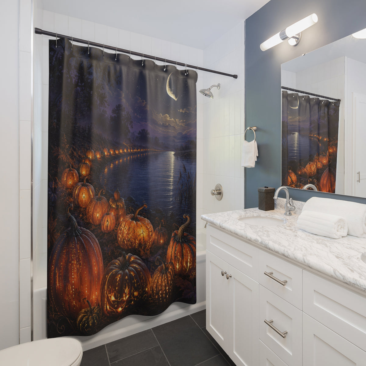 Moonlit pumpkin river landscape shower curtain beside a white vanity
