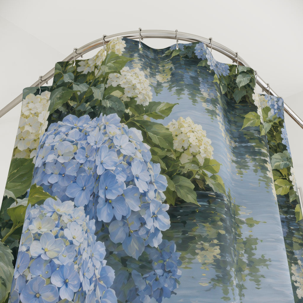 Blue and ivory hydrangeas beside a reflective garden pool shower curtain with close-up print, hooks, and folds