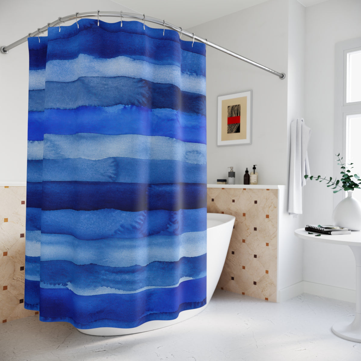 Cobalt Navy Horizontal Stripe watercolor shower curtain beside a freestanding tub